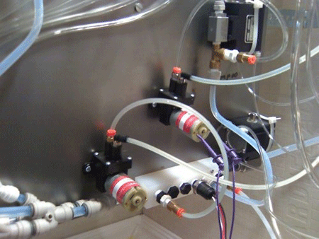 check valves and liquid pumps for automated showering system